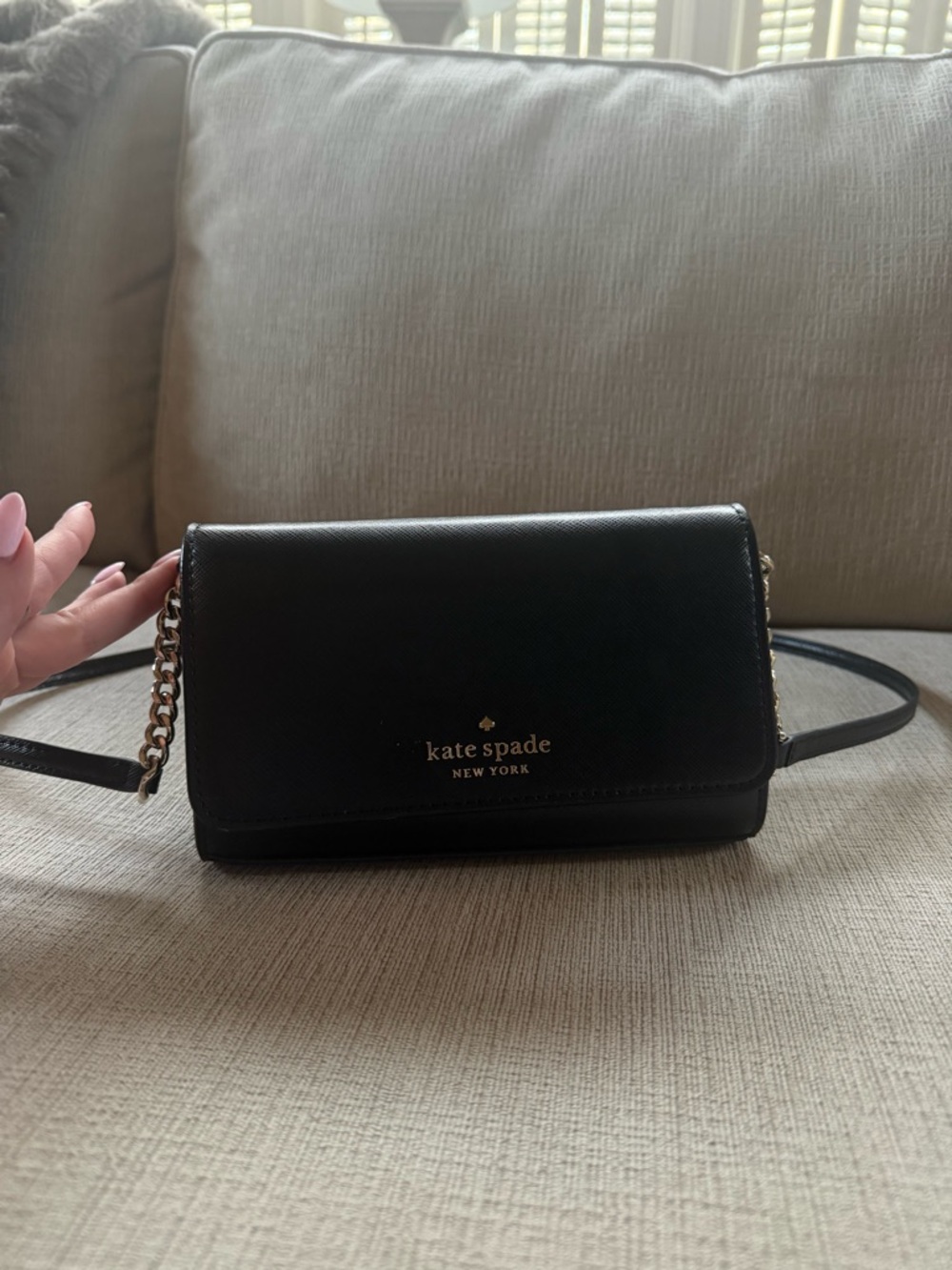 Kate Spade black leather crossbody with silver chain